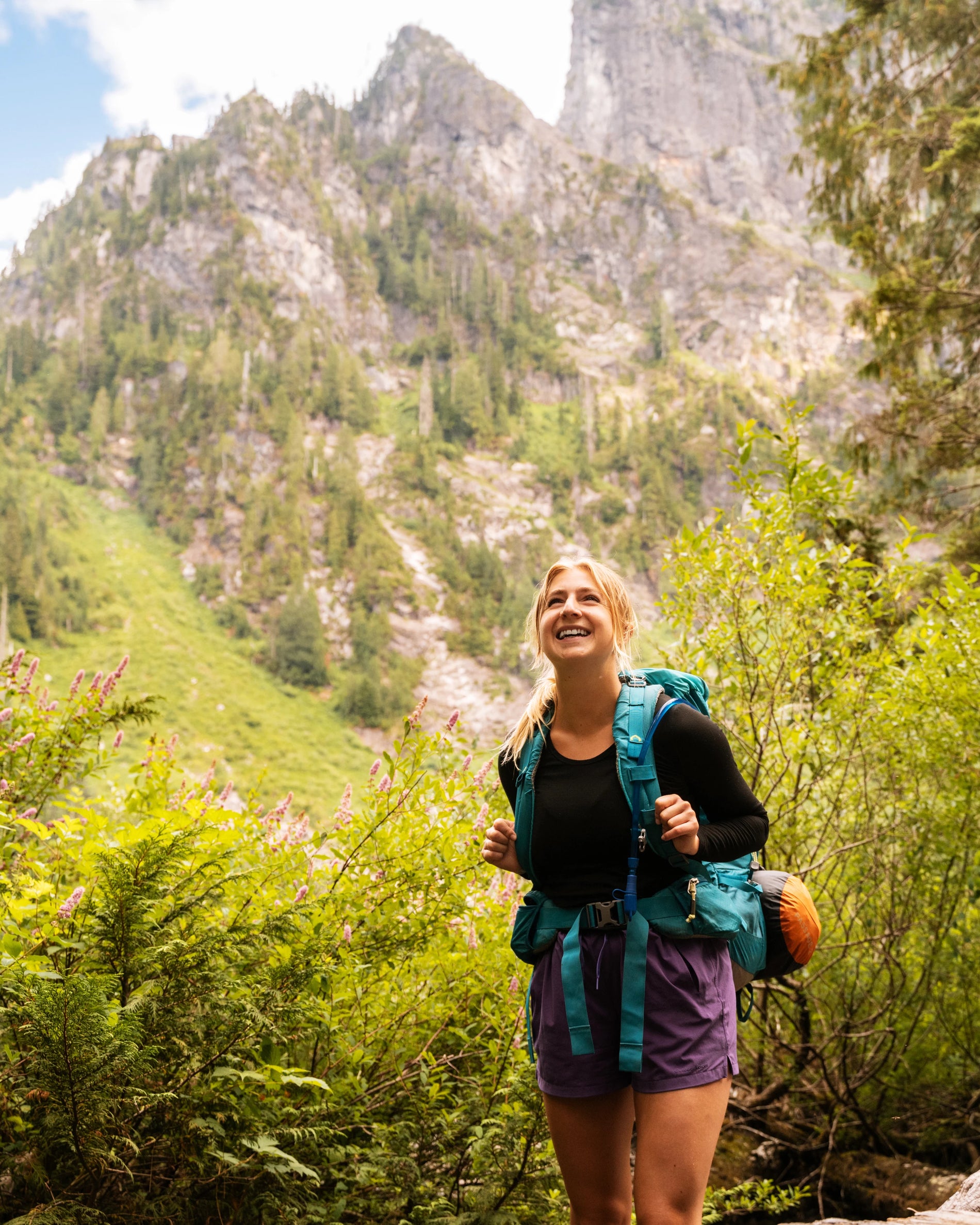 woman backpacking in the mountains
