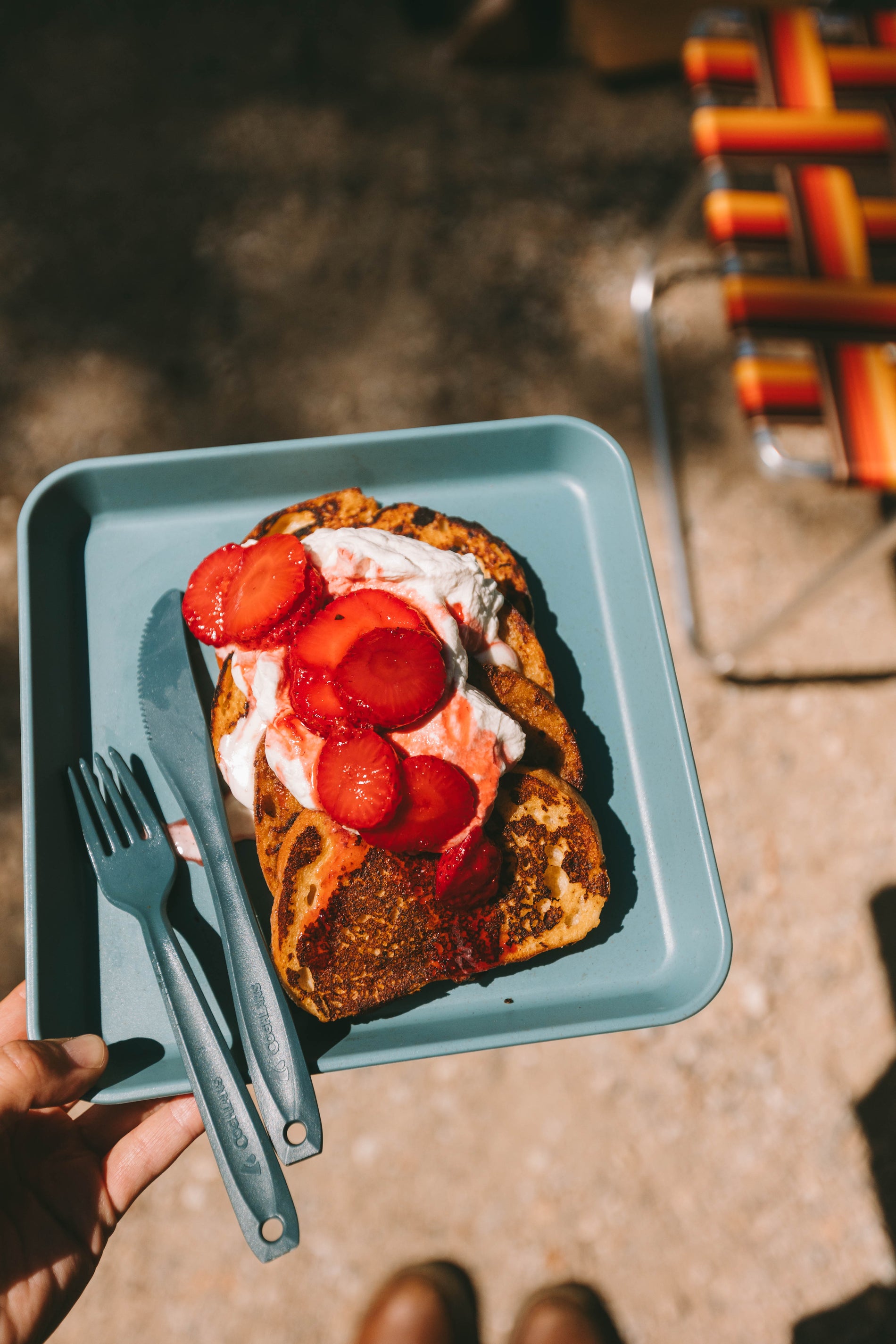 a plate of french toast at the campground